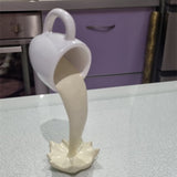 Ornement de sculpture d'art de tasse de café flottante