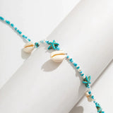 Chaîne de taille Boho en perles de riz bleu avec pendentif coquillage et étoile de mer