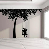 Girl on Swing Tree Wall Decal: Charming Design